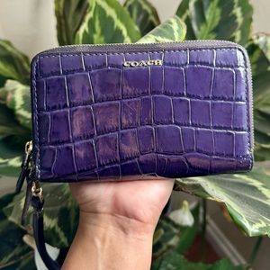 Purple Coach leather zip wallet